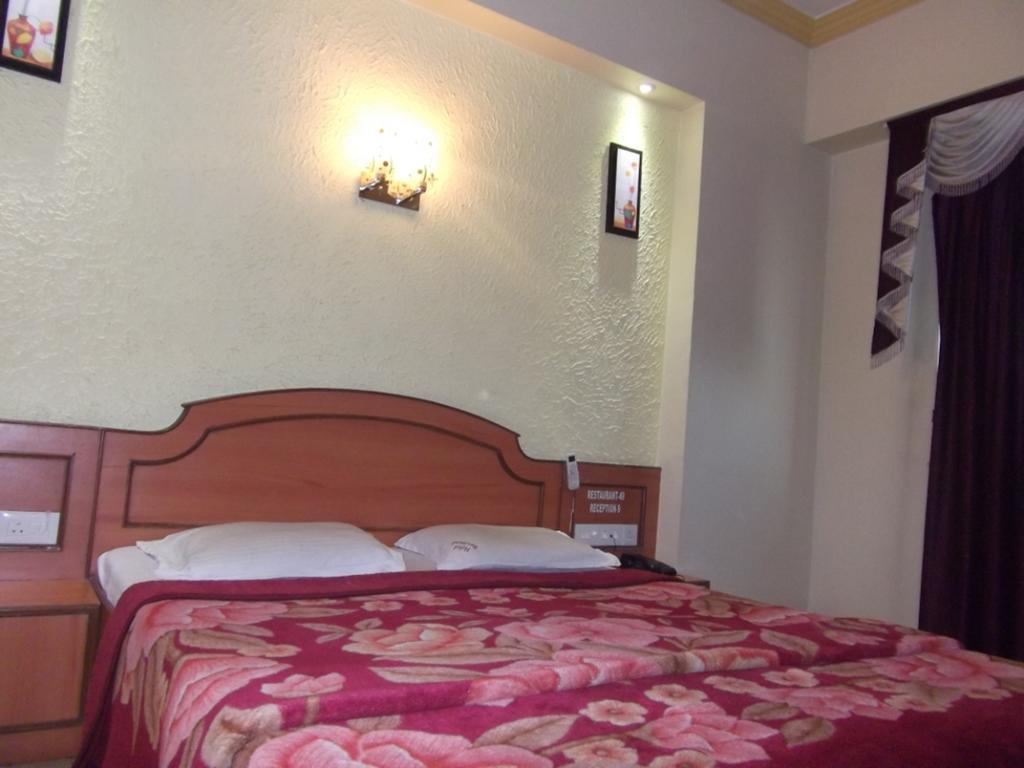 Hotel Ravikant Pune Zimmer foto
